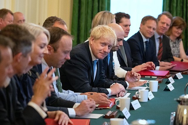 Dwindling band. Boris Johnson at his first cabinet meeting.