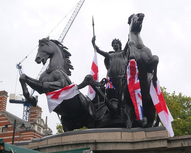 Flags from unite the kingdom demonstration 2025