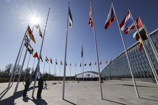 Finland’s accession to NATO marked by raising its flag at NATO HQ pic by Rory Arnold